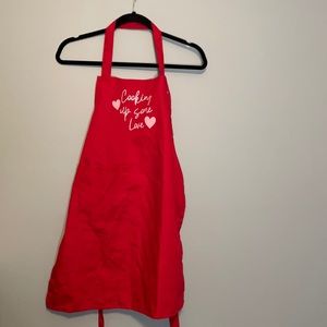 Cooking up some love red apron